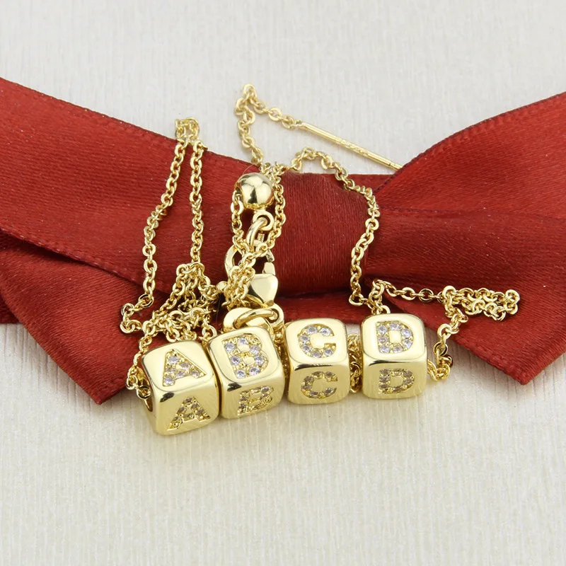 Customized Copper Gold-plated Small 26 letter Pendant Alphabet Inlaid Zircon Block Diy Name Necklaces kolye
Customized Copper Gold-plated Small 26 letter Pendant Alphabet Inlaid Zircon Block Diy Name Necklaces kolye