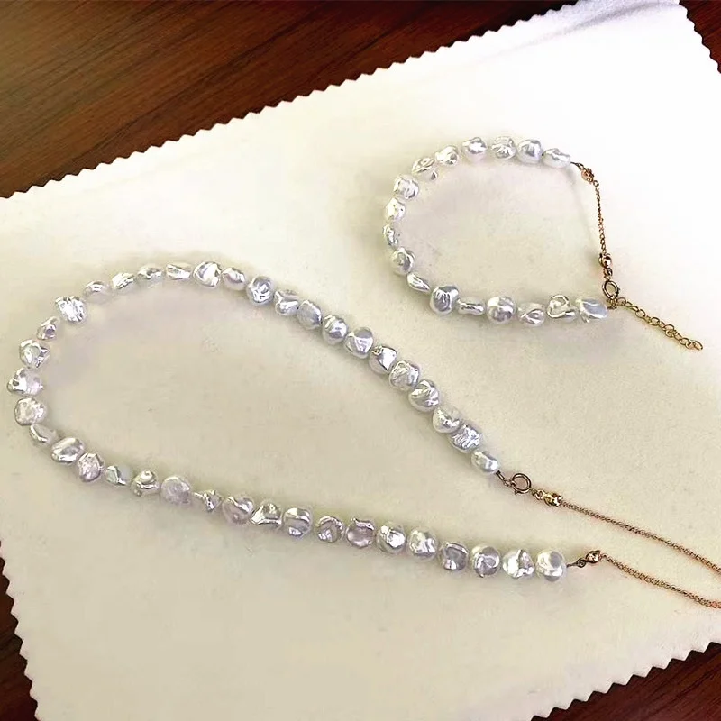 Chic nice quality bracelet jewelry set 7-8 mm AAA keshi pearl necklace, Natural white
Chic nice quality bracelet jewelry set 7-8 mm AAA keshi pearl necklace, Natural white