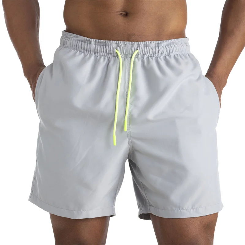 PT376 Elastic waist drawstring design polyester beach board shorts custom gym mesh Swim running men shorts
PT376 Elastic waist drawstring design polyester beach board shorts custom gym mesh Swim running men shorts