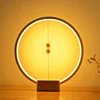 /product-detail/new-product-creative-table-lamp-with-usb-port-and-ellipse-shade-heng-balance-magnetic-floating-desk-table-lamp-62347488569.html