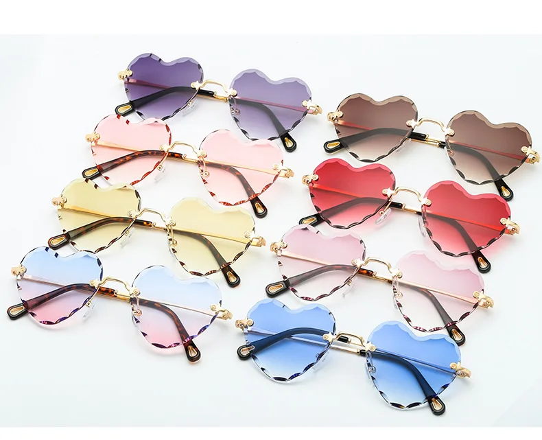 Fashion Woman Shade Wave Frame Rimless Heart Shape Sunglasses 2022 New Arrivals Colorful Ocean Lens UV400 Sun Glasses
Fashion Woman Shade Wave Frame Rimless Heart Shape Sunglasses 2022 New Arrivals Colorful Ocean Lens UV400 Sun Glasses