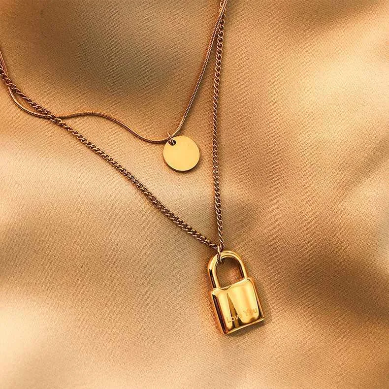 Stainless steel titanium steel double layer chain lock pendant temperament necklace female snake bone chain
Stainless steel titanium steel double layer chain lock pendant temperament necklace female snake bone chain
