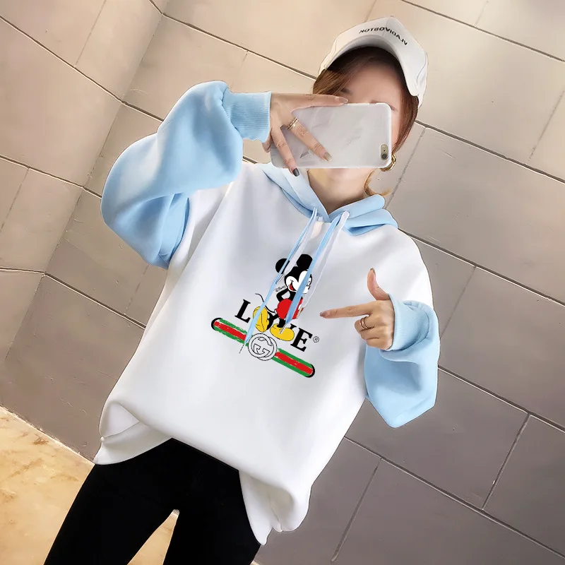 Autumn and winter 2020 cashmere Mickey hooded sweater women's color matching warm coat top wholesale
Autumn and winter 2020 cashmere Mickey hooded sweater women's color matching warm coat top wholesale