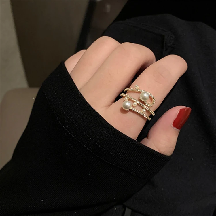 Aimgal Jewelry Japanese retro adjustable Pearl copper alloy rings female drop shipping
Aimgal Jewelry Japanese retro adjustable Pearl copper alloy rings female drop shipping