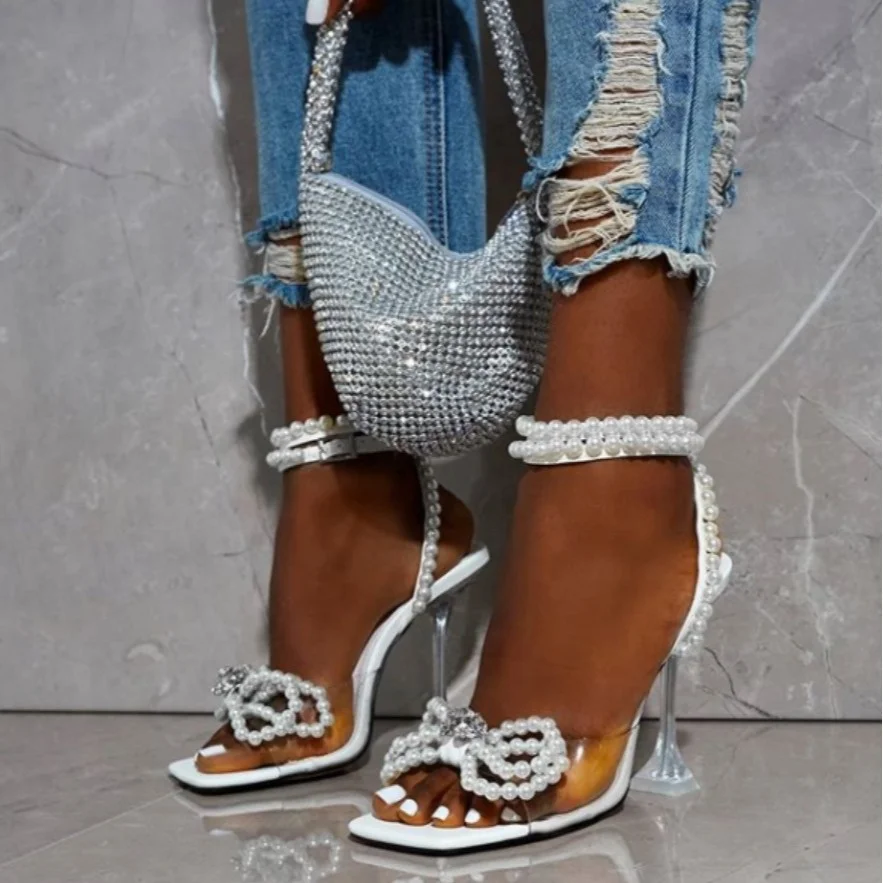 2021 New Arrival European and American Transparent High Heel Dress Shoes Pumps Sexy Pearl Diamond Beaded Bow Tie Women's Sandals
2021 New Arrival European and American Transparent High Heel Dress Shoes Pumps Sexy Pearl Diamond Beaded Bow Tie Women's Sandals