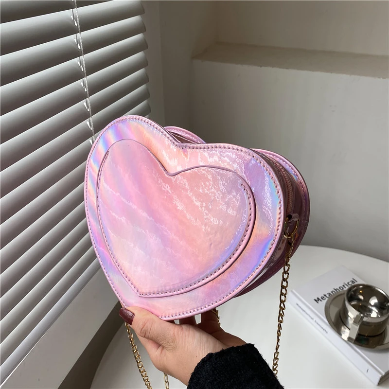 Amazon hot sale shoulder bag laser mirror PU leather chain bag heart-shaped fashion lady messenger handbag
Amazon hot sale shoulder bag laser mirror PU leather chain bag heart-shaped fashion lady messenger handbag