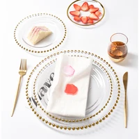 Wedding table accessories gold silver bead clear glass charger plate for wedding and event
Wedding table accessories gold silver bead clear glass charger plate for wedding and event