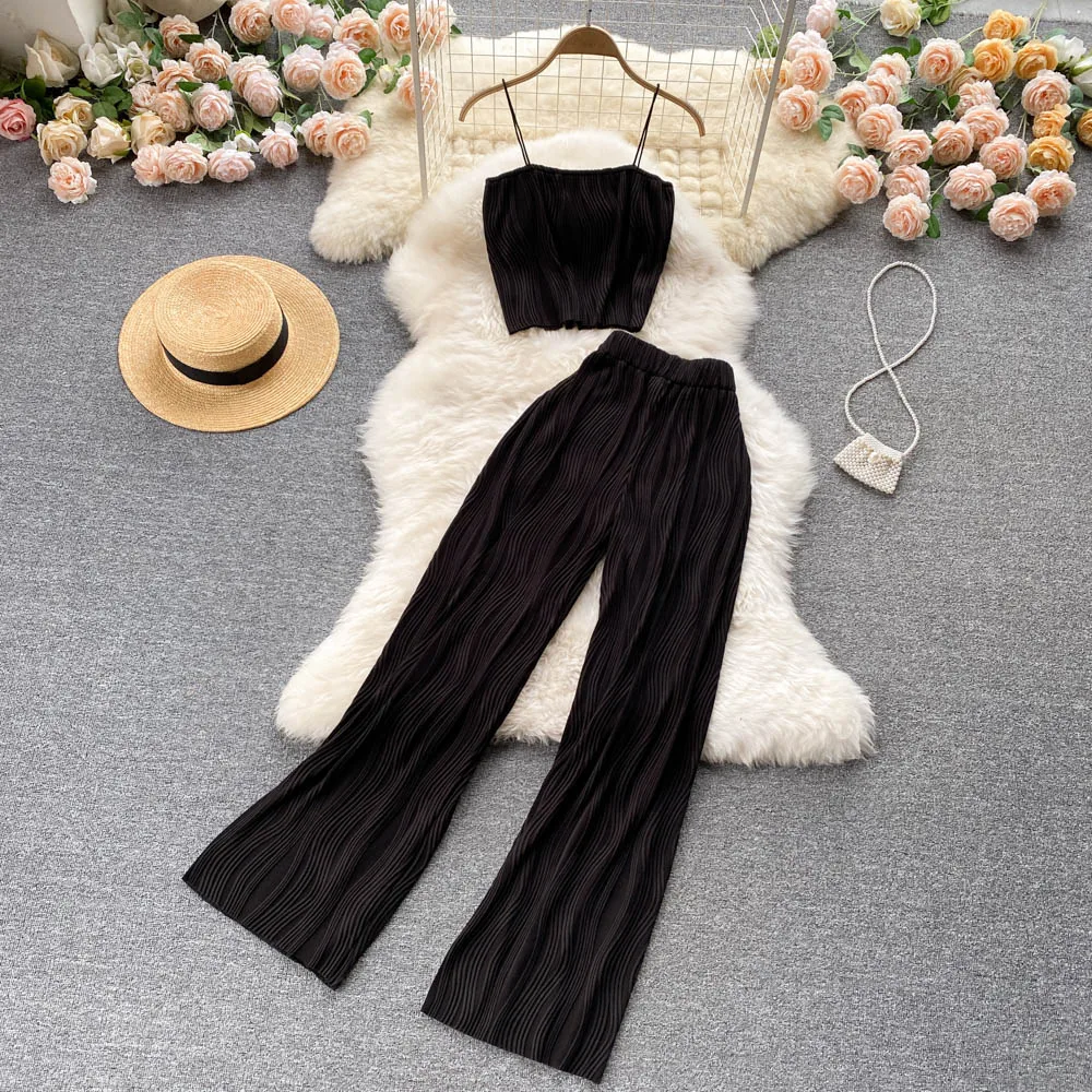 Ins holiday style suspender bra women's wavy pit strip short top High Waist Wide Leg Pants two-piece set, Multiple colors
Ins holiday style suspender bra women's wavy pit strip short top High Waist Wide Leg Pants two-piece set, Multiple colors