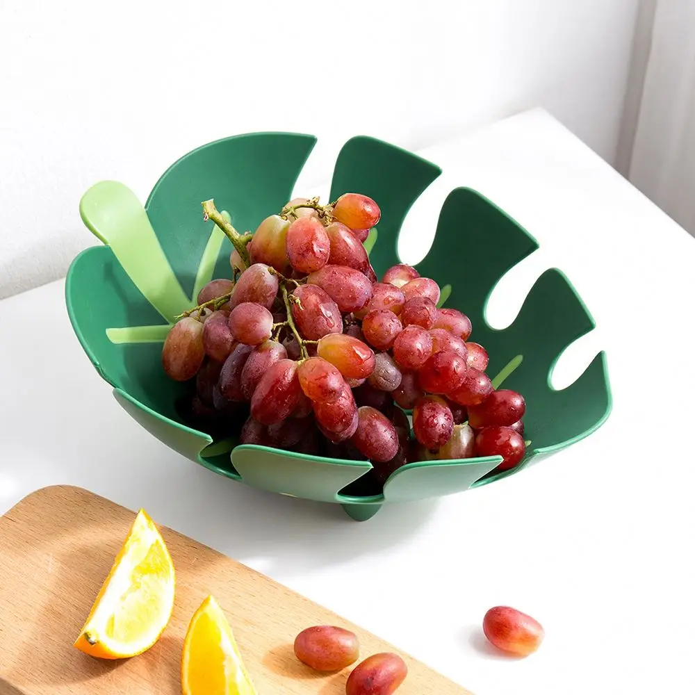 Modern minimalist fruit plate Leaf shape Fruit storage basket Living room bedroom kitchen desk home decoration accessories gift
Modern minimalist fruit plate Leaf shape Fruit storage basket Living room bedroom kitchen desk home decoration accessories gift