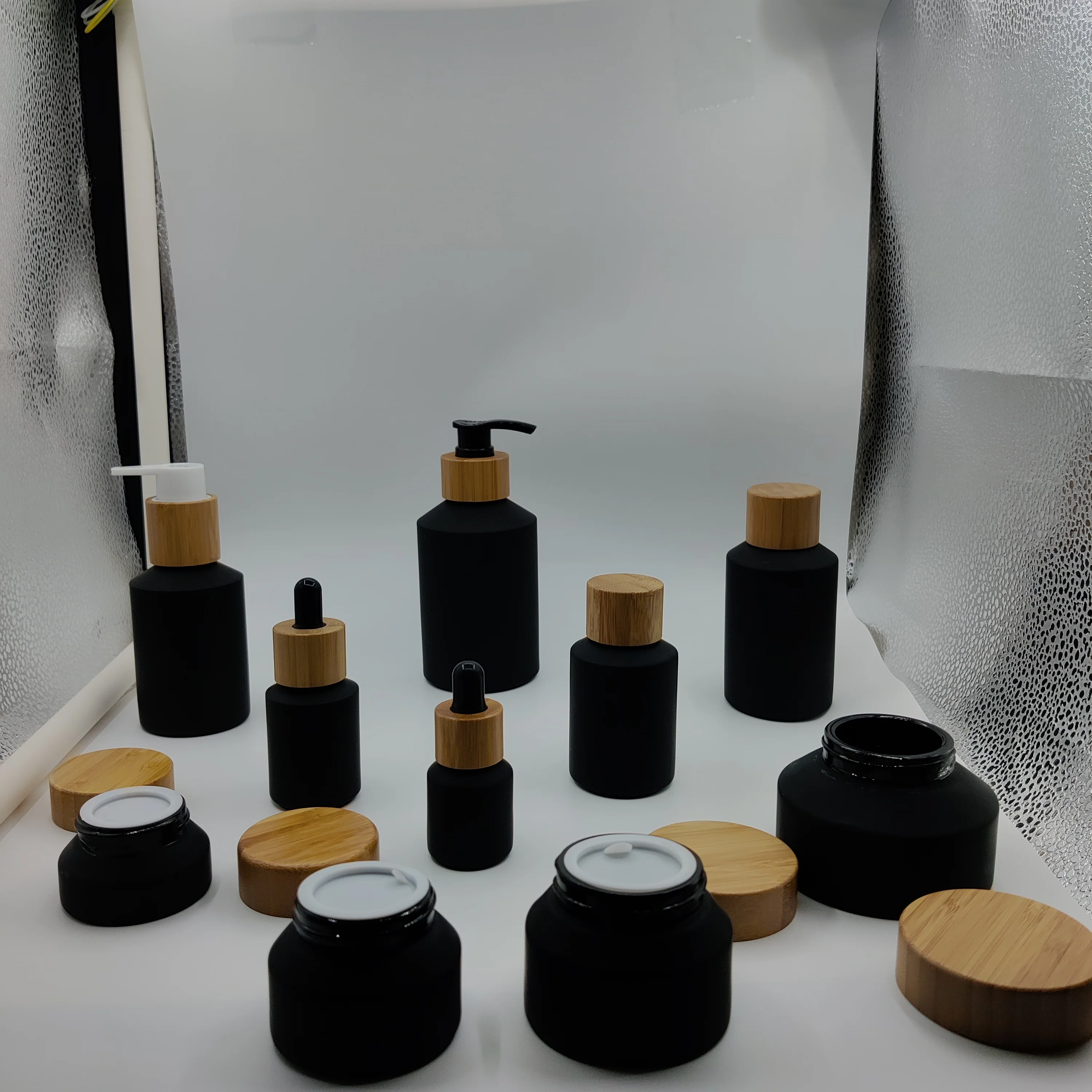 highend 15-200ml15-100gfrosted matte black cosmetic glass bottle and jar bamboo pump bottle for balm lotion serum cream full set
highend 15-200ml15-100gfrosted matte black cosmetic glass bottle and jar bamboo pump bottle for balm lotion serum cream full set