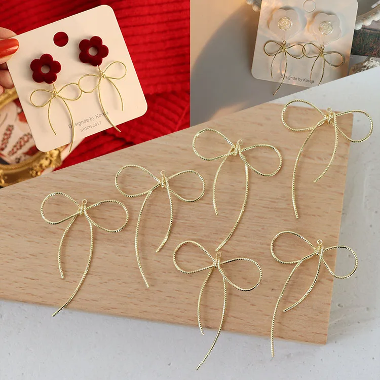 Cute Minimalist Bending Bowknot Copper Wire Hollow Bow Shape Metal Charms DIY Jewellery Making Material for Hair Accessories, Gold
Cute Minimalist Bending Bowknot Copper Wire Hollow Bow Shape Metal Charms DIY Jewellery Making Material for Hair Accessories, Gold