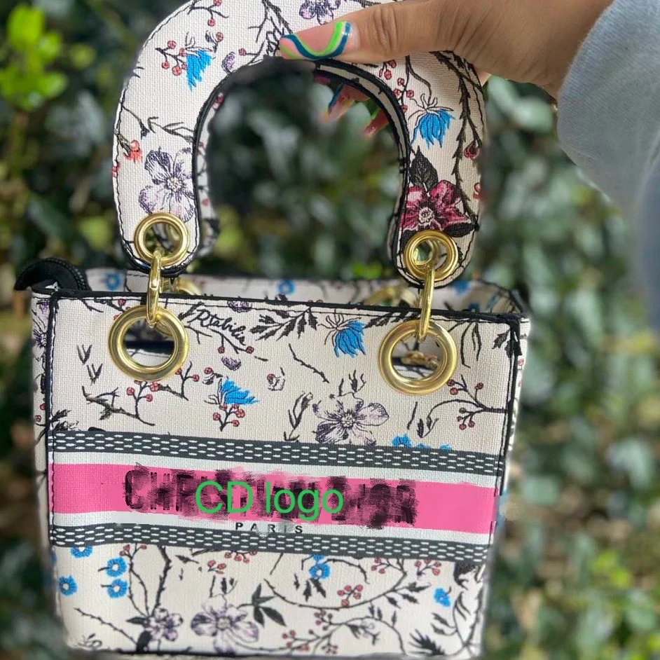 2021 women designer famous brand luxury ladies replicate graffiti handbags CD bags tote Portable Shoulder Messenger for women, 7colors
2021 women designer famous brand luxury ladies replicate graffiti handbags CD bags tote Portable Shoulder Messenger for women, 7colors