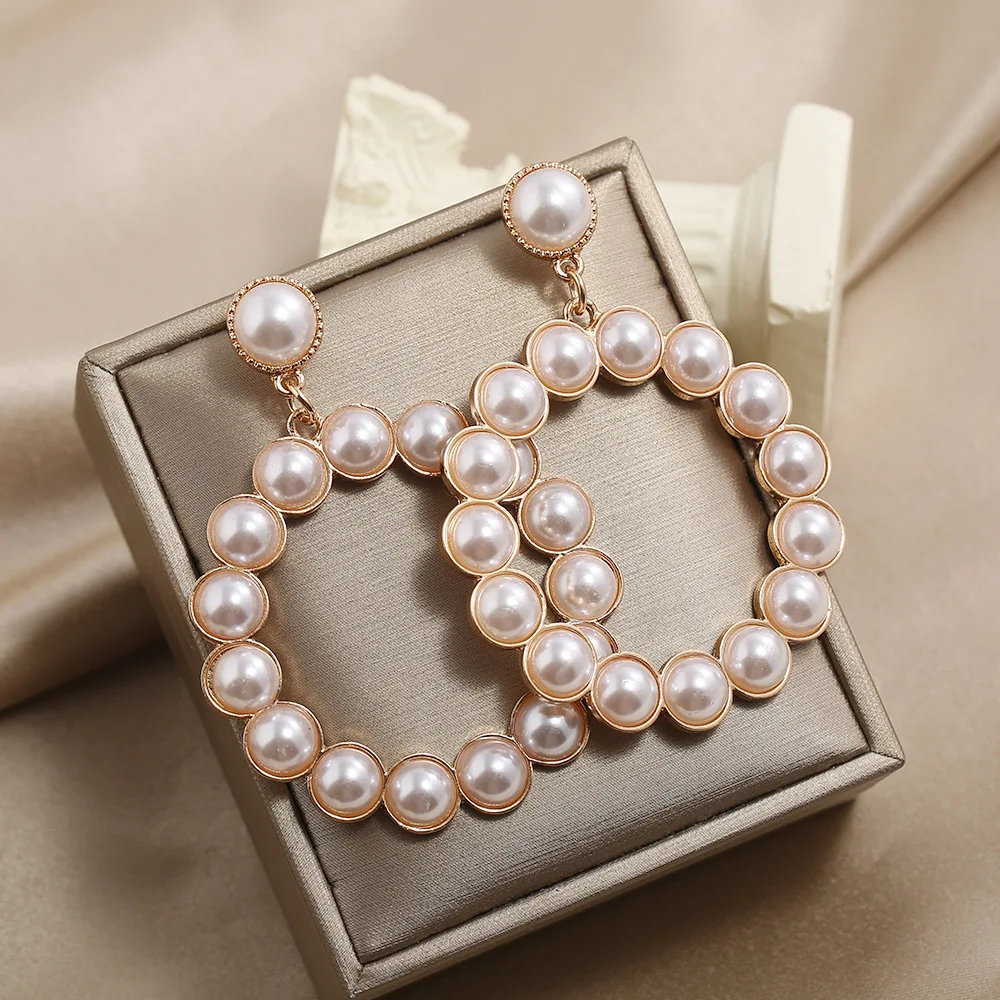 Wholesale Factory Direct fashion simple love imitation pearl earrings hollow sweet girl heart earrings, Gold, silver, rose gold
Wholesale Factory Direct fashion simple love imitation pearl earrings hollow sweet girl heart earrings, Gold, silver, rose gold