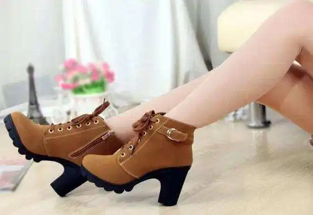 Autumn and winter 2021 new high-heeled women's boots cross-strap short thick heel fashion boots leather boots
