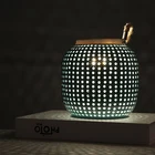 Factory direct sell modern design unique ceramic lantern table lamp with handle