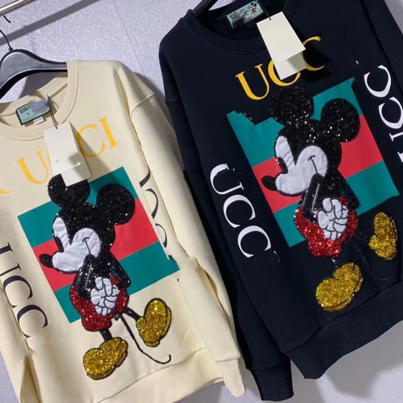 2020 new cotton sequined cartoon Mickey Mouse loose medium long round collar hoodie
2020 new cotton sequined cartoon Mickey Mouse loose medium long round collar hoodie