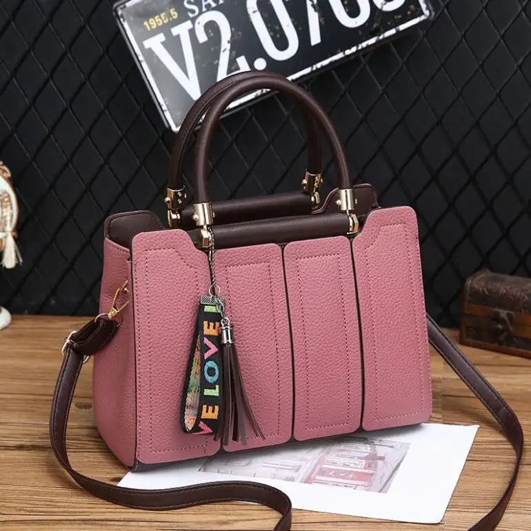 2021 stylish high quality handbags Casual shoulder bag with tassel hangings Fashionable simple handbags for women, 6 colors
2021 stylish high quality handbags Casual shoulder bag with tassel hangings Fashionable simple handbags for women, 6 colors