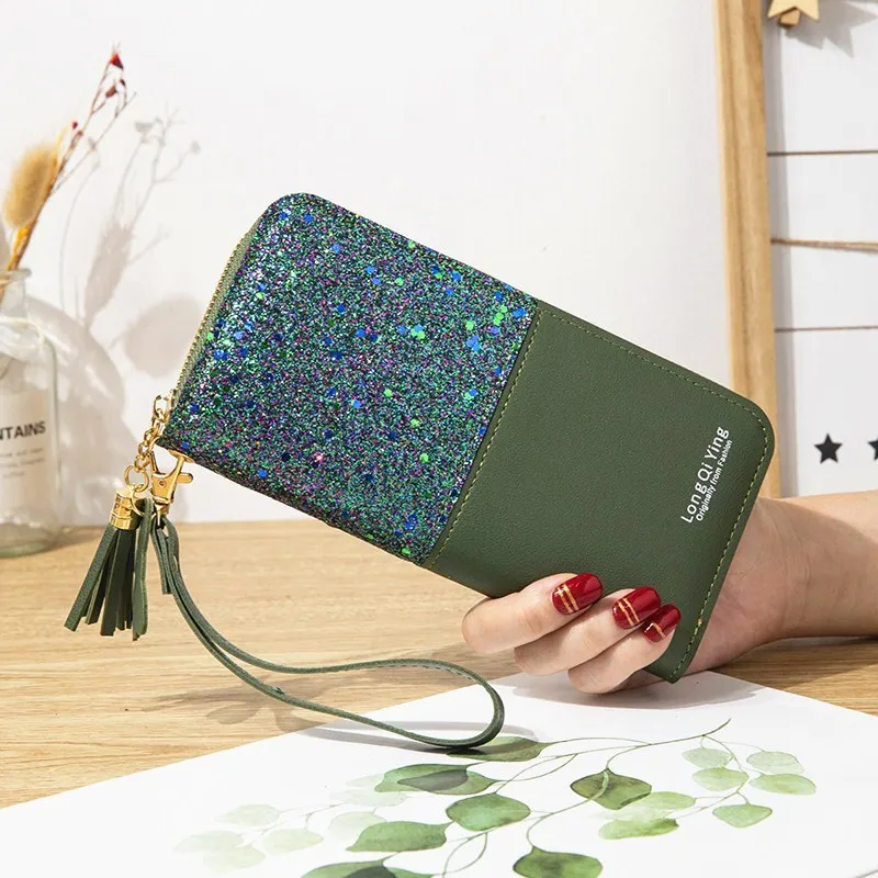 New wallet long women's Zipper Wallet female student's Korean splicing color contrast tassel versatile card case phone bag
New wallet long women's Zipper Wallet female student's Korean splicing color contrast tassel versatile card case phone bag