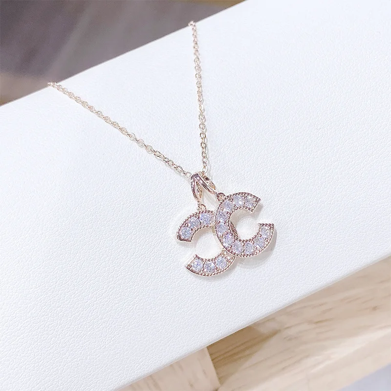 Wholesale fashion brass gold plated women jewellery crystal zircon cc shape letter C necklaces jewelry
Wholesale fashion brass gold plated women jewellery crystal zircon cc shape letter C necklaces jewelry