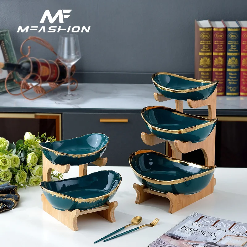 Mfashion Double layer fruit plate bamboo and wooden frame ceramic dried fruit dessert plate double gold rim ingot fruit basket, Green
Mfashion Double layer fruit plate bamboo and wooden frame ceramic dried fruit dessert plate double gold rim ingot fruit basket, Green