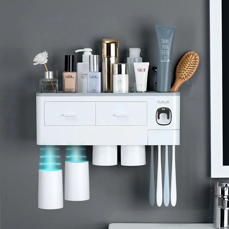 Two Tooth Brushing Cups And Automatic Toothpaste Dispenser Wall-mounted Plastic Toothbrush Holder
Two Tooth Brushing Cups And Automatic Toothpaste Dispenser Wall-mounted Plastic Toothbrush Holder