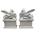 Hand-carved white marble lion sculpture with wings