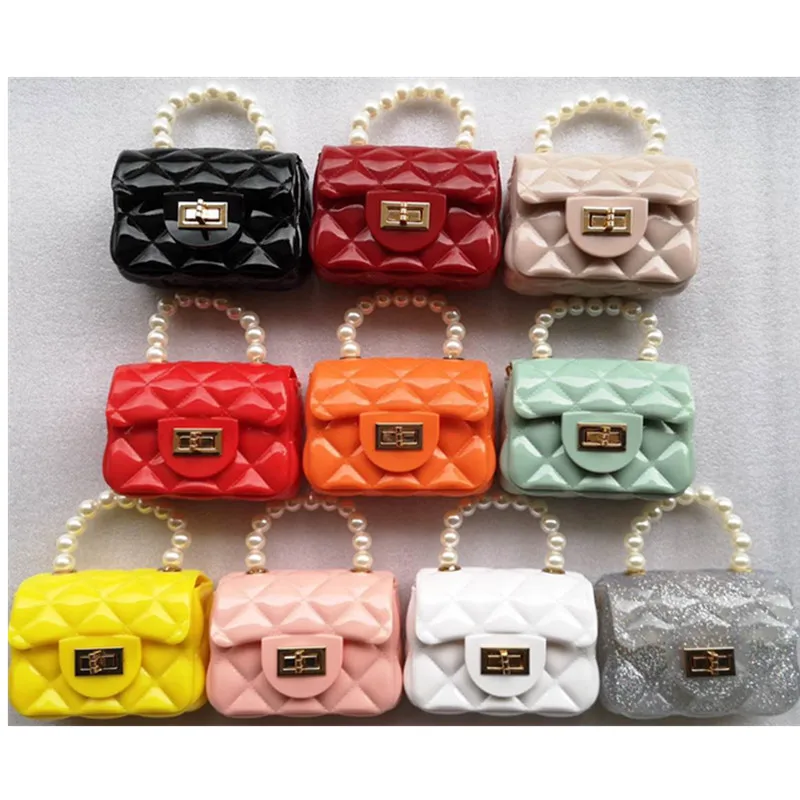 OEM PVC children Girls Shoulder Bags Jelly Purses silicone Handbags kids jelly bags with Pearl Handle
OEM PVC children Girls Shoulder Bags Jelly Purses silicone Handbags kids jelly bags with Pearl Handle