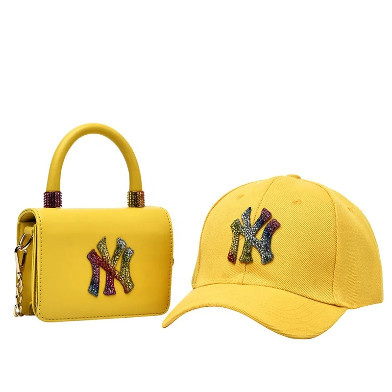 2021 Fashion Custom Logo Hat and Bag Set Chain Shoulder Mini Yankee Hat Bags Sets Women Handbags with Matching Hats
2021 Fashion Custom Logo Hat and Bag Set Chain Shoulder Mini Yankee Hat Bags Sets Women Handbags with Matching Hats