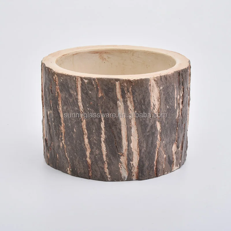 short concrete candle containers with tree design