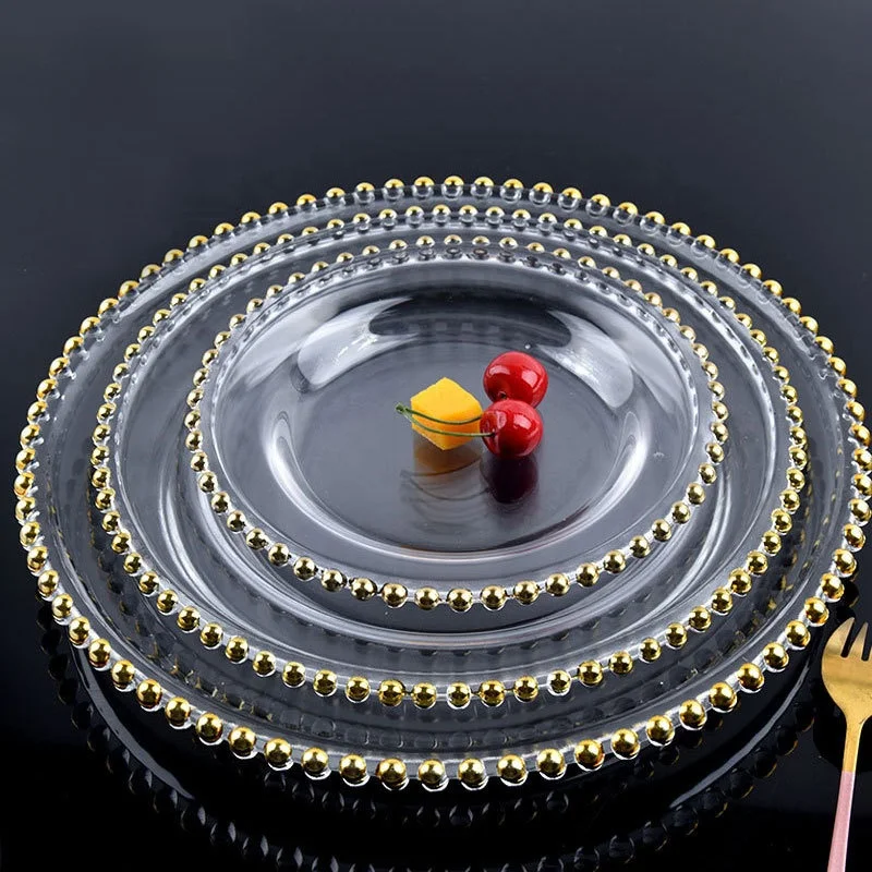 European and American style transparent glass western cake plate with gold bead edge
European and American style transparent glass western cake plate with gold bead edge