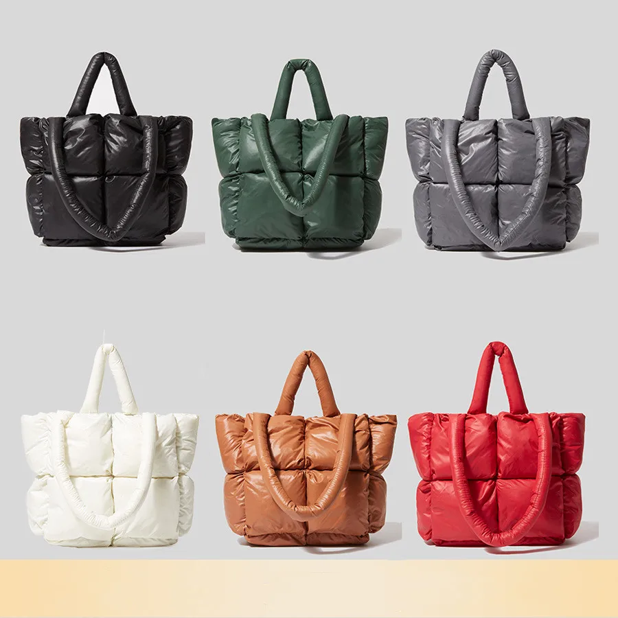 Winter new simple design pure color soft small square filling one-shoulder handbag down cotton female bag
Winter new simple design pure color soft small square filling one-shoulder handbag down cotton female bag