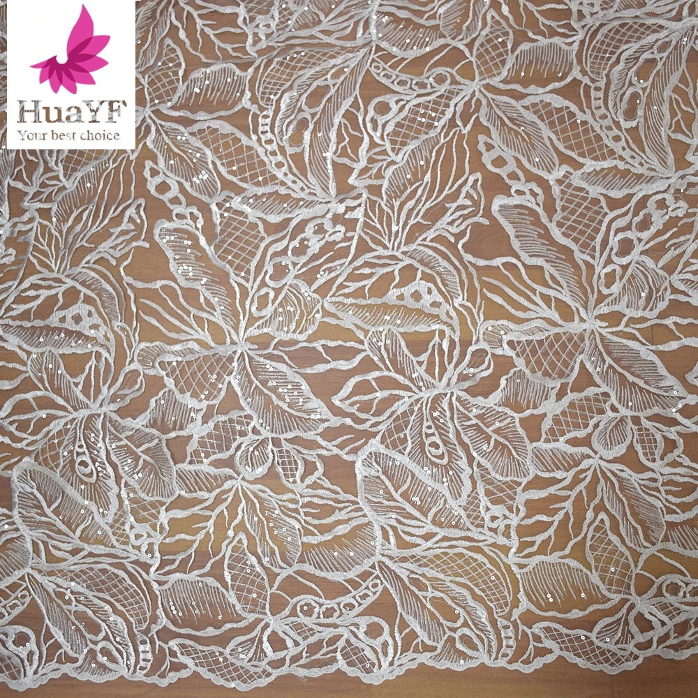 Ivory bridal sequins embroidery french tulle lace fabric for bridal wedding dress 
Ivory bridal sequins embroidery french tulle lace fabric for bridal wedding dress