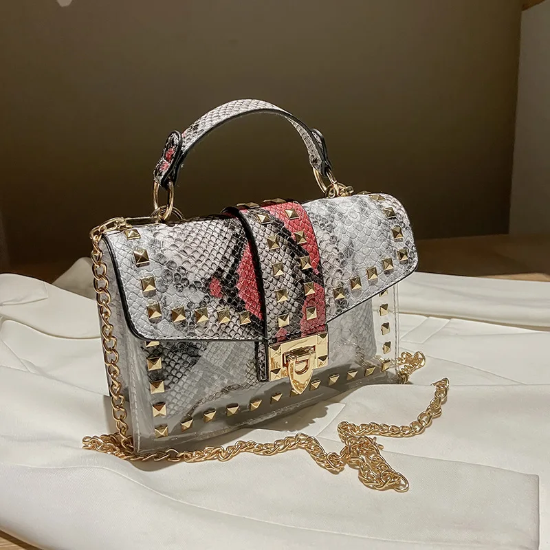 New Arrivals Summer Pu Snakeskin Bag Pvc Transparent Rivet Personality Designer Bags 2021 Hand Bags Ladies Purse And Handbag
New Arrivals Summer Pu Snakeskin Bag Pvc Transparent Rivet Personality Designer Bags 2021 Hand Bags Ladies Purse And Handbag