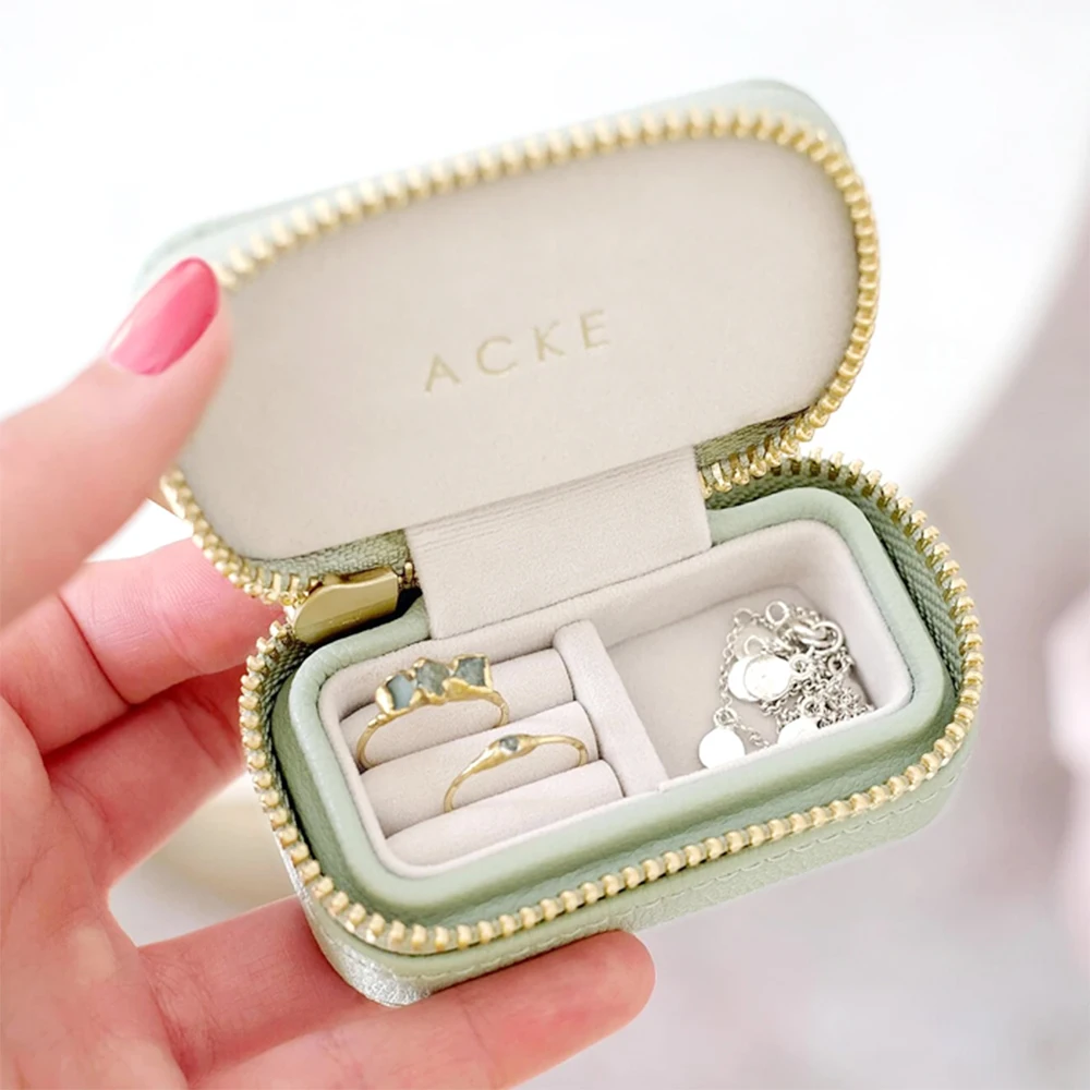 Custom logo mini portable travel jewelry box ring zipper velvet travel box jewelry packaging travel small velvet jewelry box
Custom logo mini portable travel jewelry box ring zipper velvet travel box jewelry packaging travel small velvet jewelry box