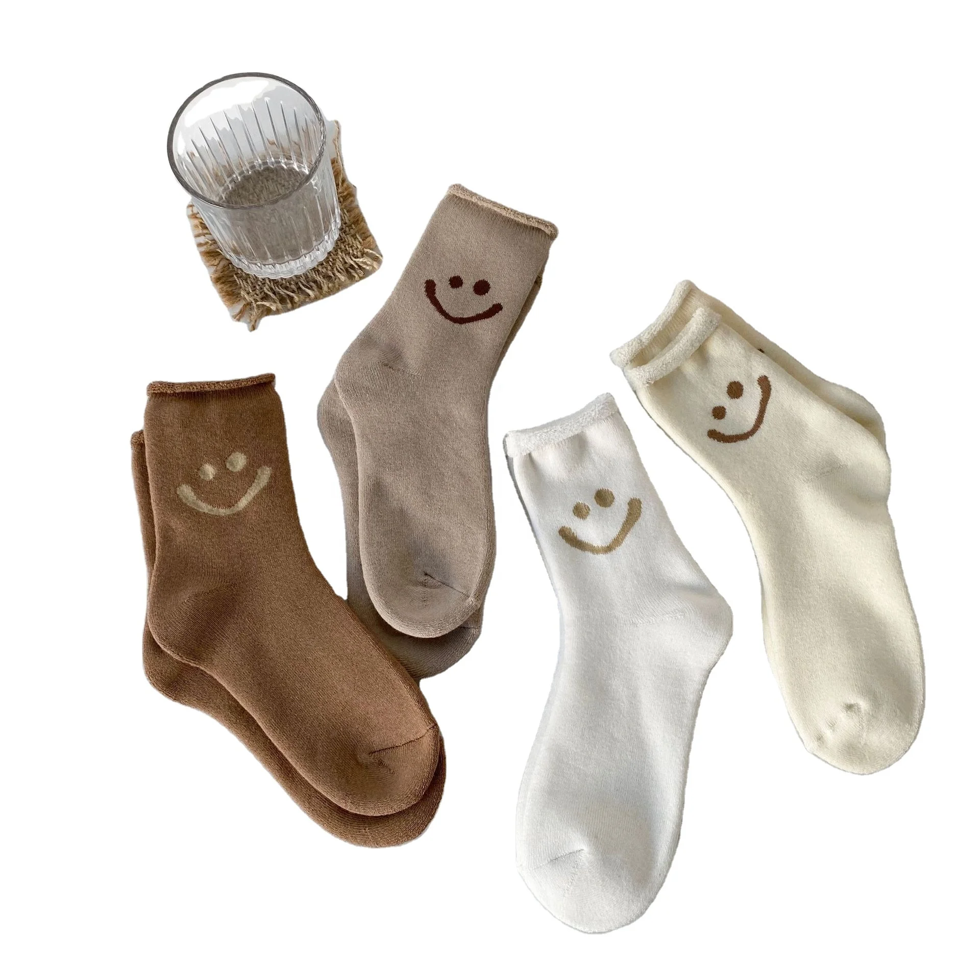 Wholesale customized solid color curling comfortable thick warm terry socks smiling face women socks, Custom color
Wholesale customized solid color curling comfortable thick warm terry socks smiling face women socks, Custom color