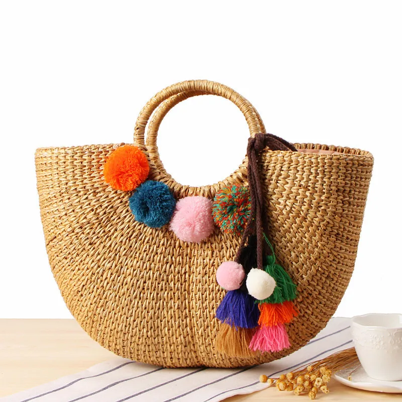 Hand-carrying straw woven bag handmade yellow straw woven handbag colorful tassel yarn ball beach bag
Hand-carrying straw woven bag handmade yellow straw woven handbag colorful tassel yarn ball beach bag