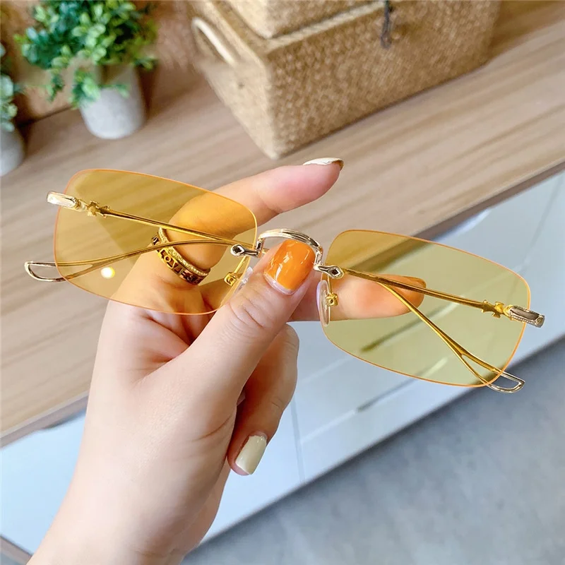 Custom Logo Rimless Women Glasses Sunglasses Shades Simplicity Metal Ocean Piece Sun Glasses for Men
Custom Logo Rimless Women Glasses Sunglasses Shades Simplicity Metal Ocean Piece Sun Glasses for Men