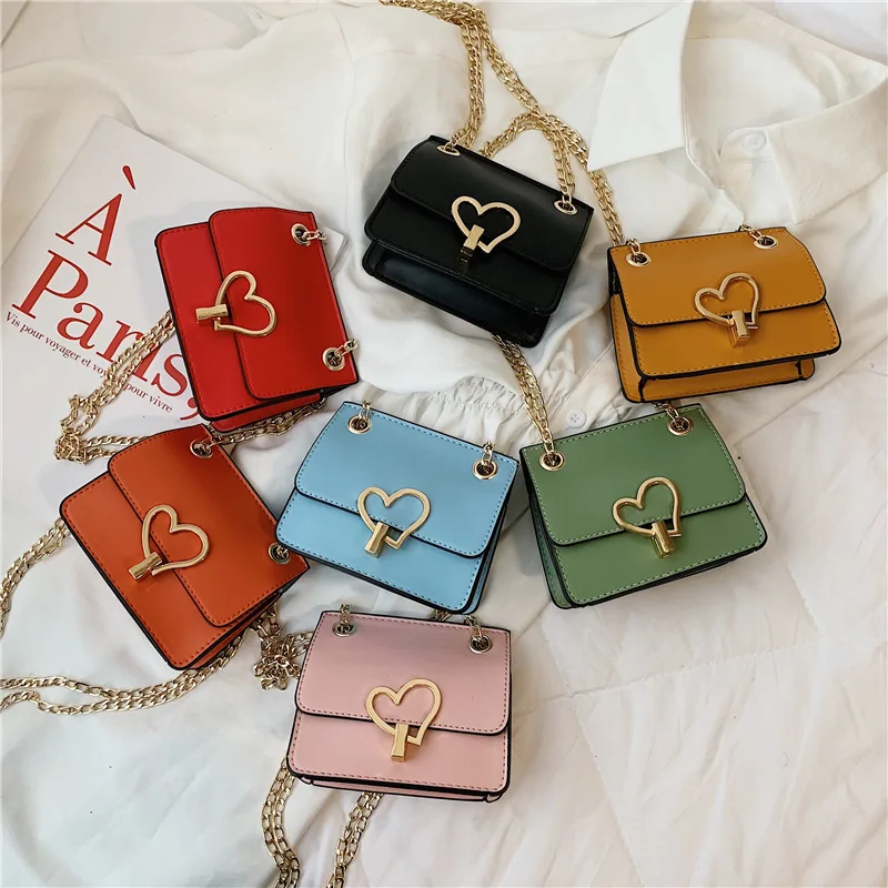 Hot Mini Children Handbag Lovely PU Heart Lock For Girl Shoulder Bag Party Gift Bags Wholesale Child Bag
Hot Mini Children Handbag Lovely PU Heart Lock For Girl Shoulder Bag Party Gift Bags Wholesale Child Bag
