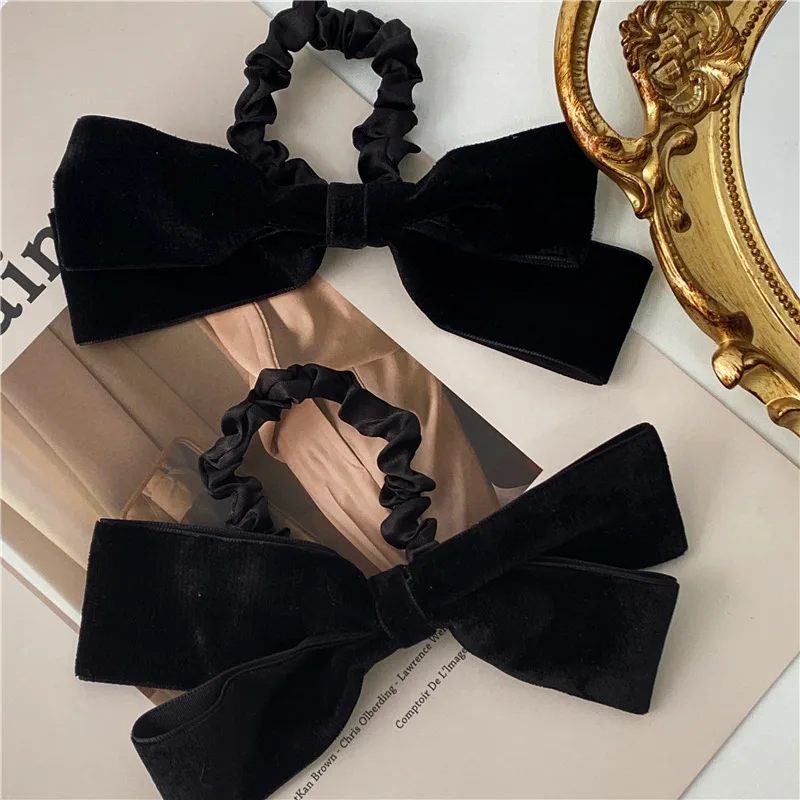 Explosive style Korean simple temperament super large bow hair circle texture fabric folds hair rope black bow hair tie
Explosive style Korean simple temperament super large bow hair circle texture fabric folds hair rope black bow hair tie