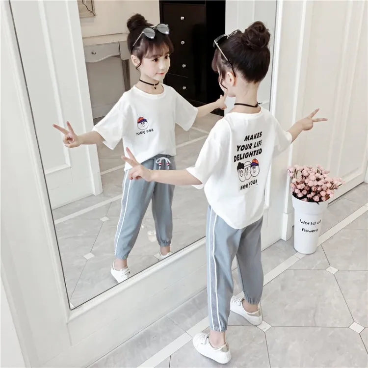 2021 summer design girls' clothing suit casual printed T-shirt sports drawstring loose pants two-piece suit for girls clothes, Pink white 
2021 summer design girls' clothing suit casual printed T-shirt sports drawstring loose pants two-piece suit for girls clothes, Pink white