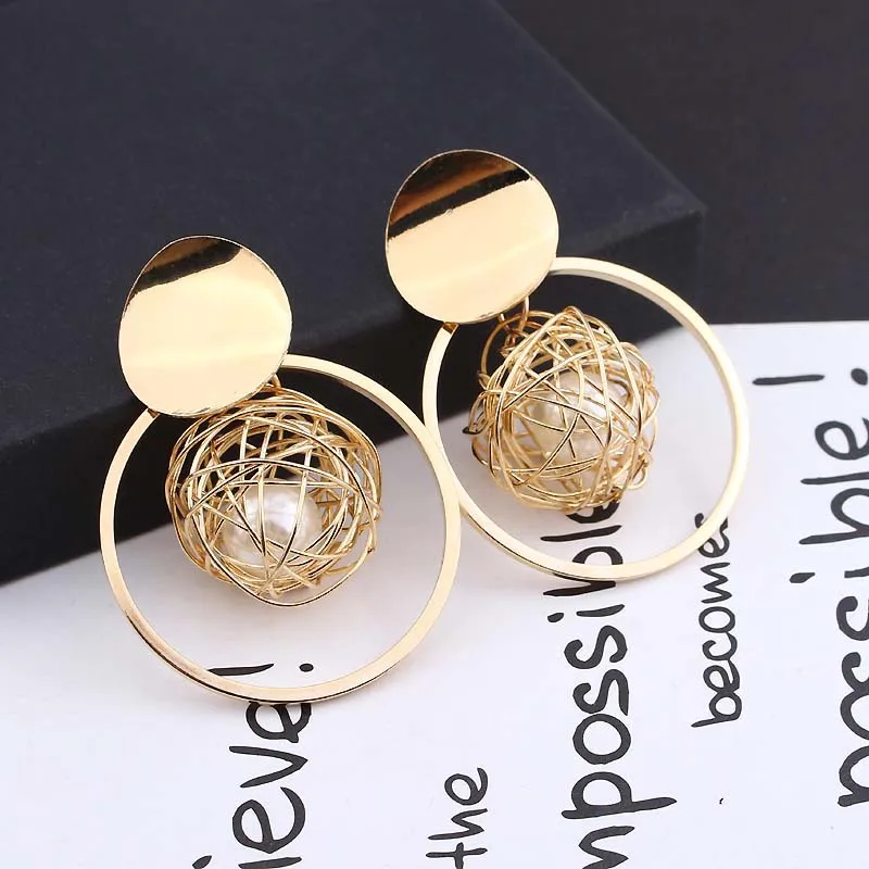 Hot Sale Gold Circle Imitation Pearl Drop Earrings Gold Wire Ball Earrings 
Hot Sale Gold Circle Imitation Pearl Drop Earrings Gold Wire Ball Earrings