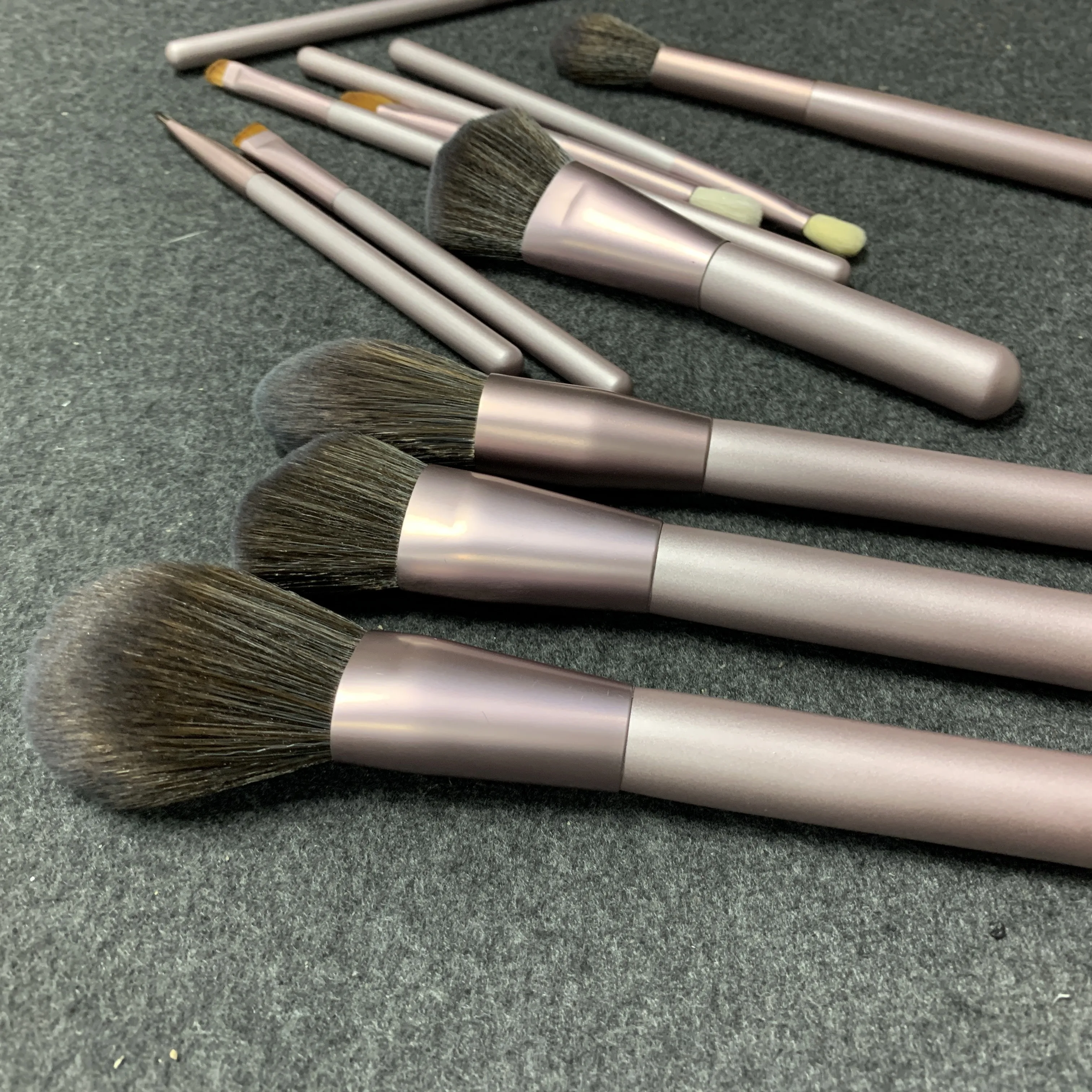 Purple wooden handle synthetic nylon hair super soft makeup brush set 12pcs ladies special makeup tool
Purple wooden handle synthetic nylon hair super soft makeup brush set 12pcs ladies special makeup tool