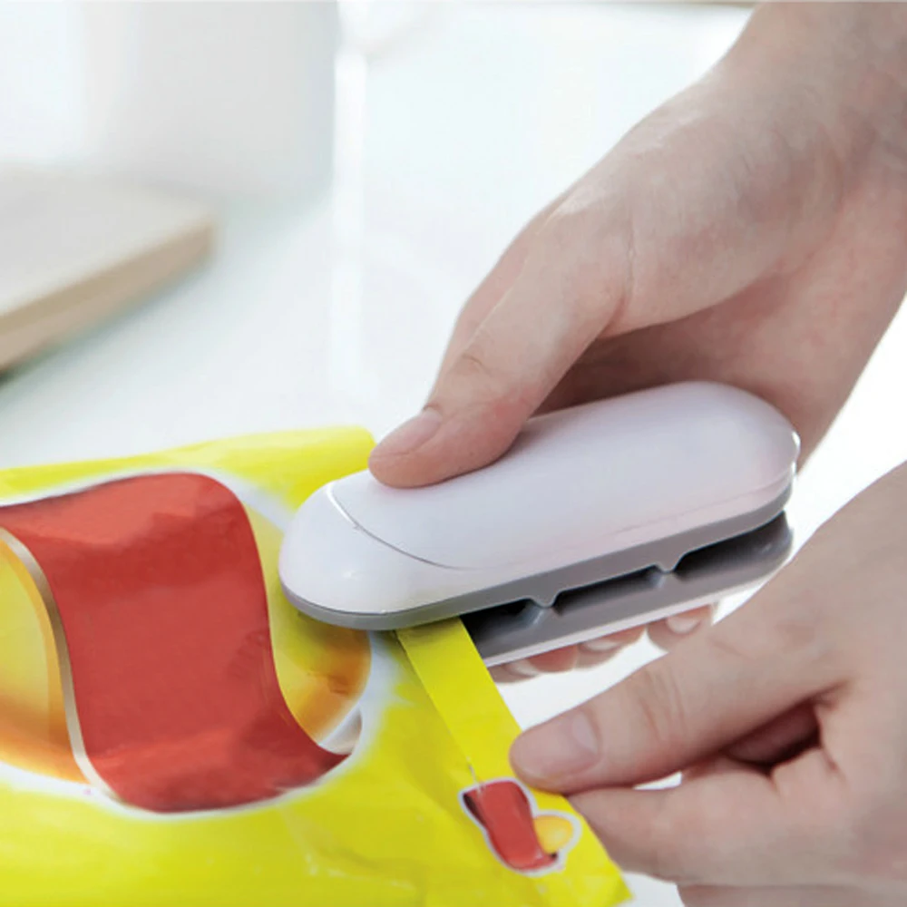 Portable Mini Sealing Machine Kitchen Storage and Organization Household Sealing Food Clip Heat Sealer for Kitchen Convenience
Portable Mini Sealing Machine Kitchen Storage and Organization Household Sealing Food Clip Heat Sealer for Kitchen Convenience