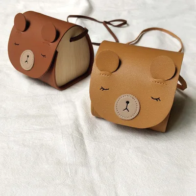Children's bag 2021new PU leather bear solid wood children's shoulder bag fashion children's all-match messenger bag
Children's bag 2021new PU leather bear solid wood children's shoulder bag fashion children's all-match messenger bag