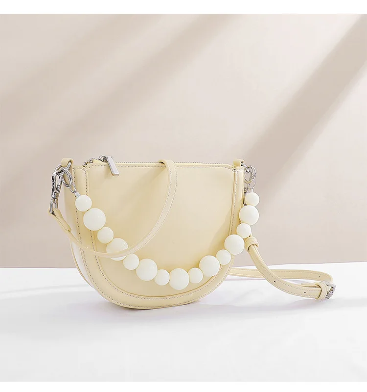 Summer small bags female 2021 luxury fashion pearl chain PU leather elegant shoulder saddle handbag crossbody bag, Yellow white black
Summer small bags female 2021 luxury fashion pearl chain PU leather elegant shoulder saddle handbag crossbody bag, Yellow white black