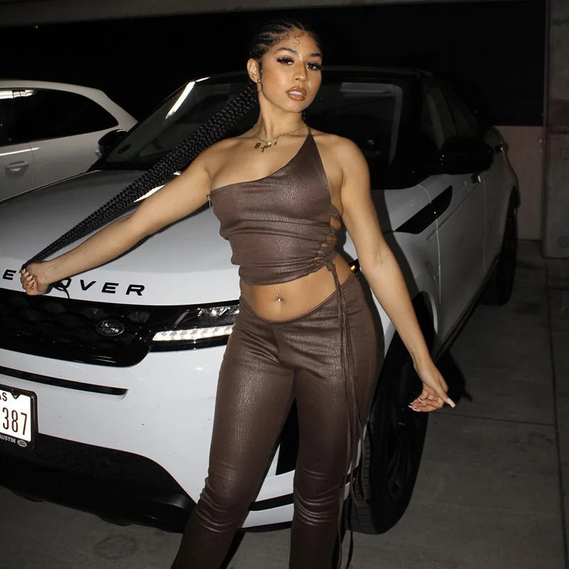 Irregular Halter Back And Waist Tie T Shirt Slim Pleated Cracked Leather Trousers Two Piece Suit Set
Irregular Halter Back And Waist Tie T Shirt Slim Pleated Cracked Leather Trousers Two Piece Suit Set
