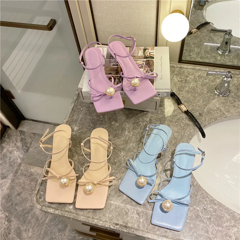 2020 summer new Korean version of pearl flip flops stiletto bow sandals, As the pic
2020 summer new Korean version of pearl flip flops stiletto bow sandals, As the pic