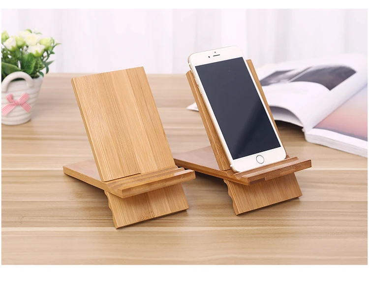 Creative desktop nanzhu mobile phone block solid wood watch TV tablet computer stand lazy mobile phone stand, Natural
Creative desktop nanzhu mobile phone block solid wood watch TV tablet computer stand lazy mobile phone stand, Natural