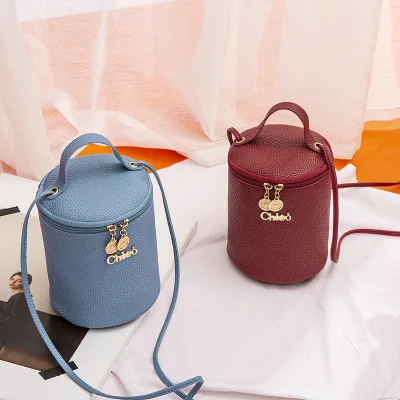 FLB209 cylinder shape girls handbag kids wholesale handbags china ladies hand bags, Black,pink,red,gray, blue
FLB209 cylinder shape girls handbag kids wholesale handbags china ladies hand bags, Black,pink,red,gray, blue