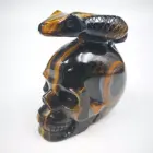 Wholesale natural crystals feng shui stone hand carved customized tiger eye skull for decorations or gifts